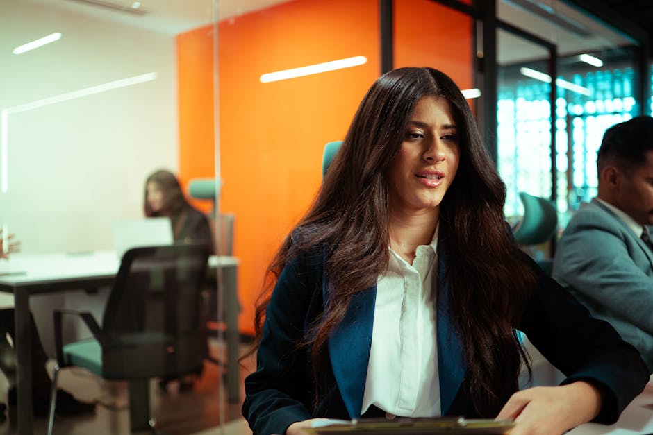 Young professionals collaborating in a modern office with vivid decor.